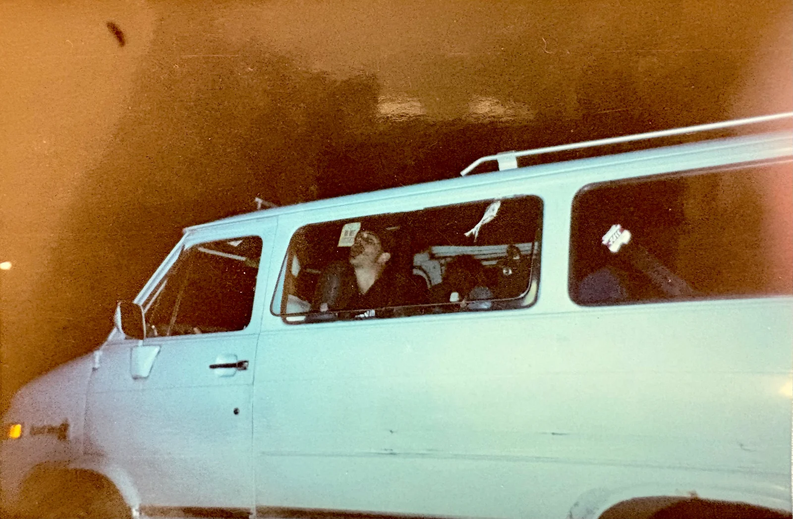 Gladys the FPM van being driven down the road back in the day.